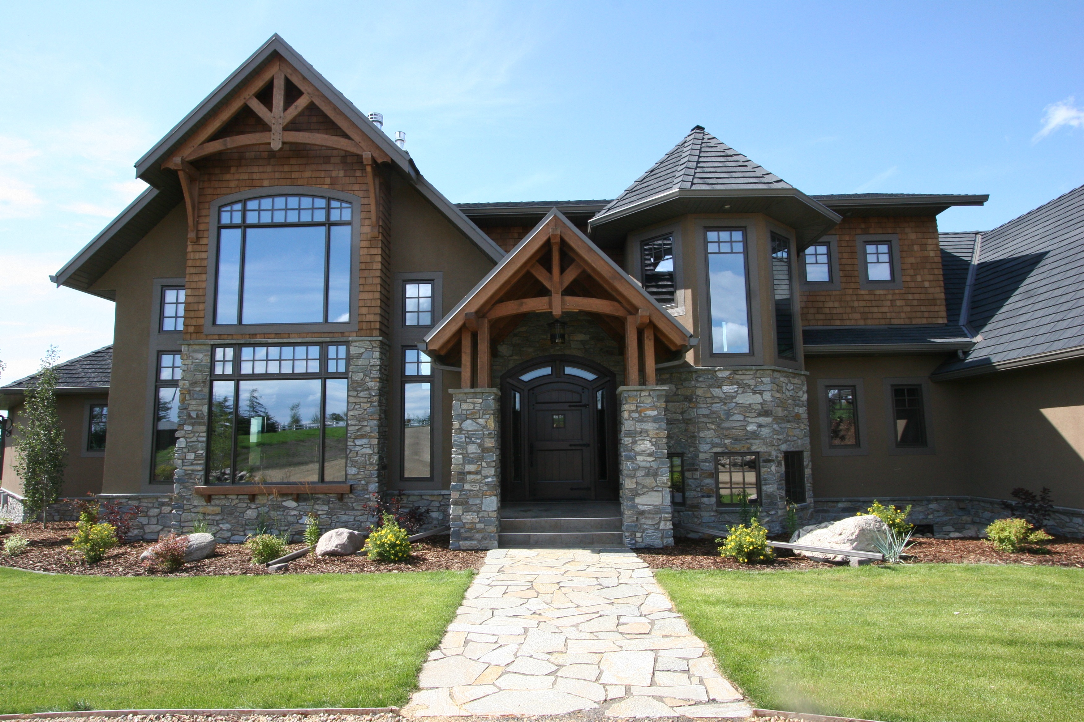 Timber Frame Home With Stone Skirting | K2 Stone